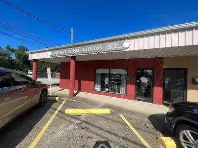 Commercial Multitenant center fronting Barrancas Ave